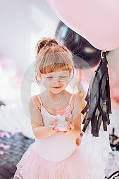 Beautiful little girl celebrating birthday party