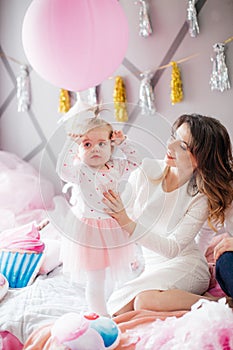 Beautiful little girl celebrating birthday party with