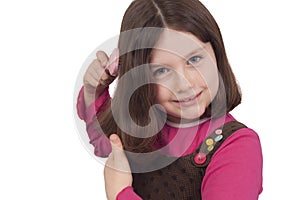 Beautiful little girl combing