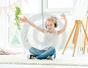 Beautiful little girl dancing to music