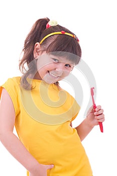 Beautiful little girl flossing her teeth