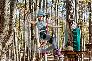 Beautiful little girl having fun in adventure Park, Montenegro