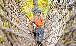 Beautiful little girl having fun in adventure Park, Montenegro