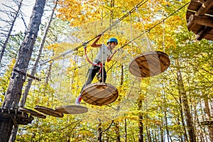 Beautiful little girl having fun in adventure Park, Montenegro