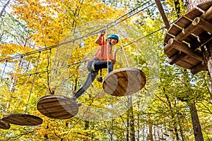 Beautiful little girl having fun in adventure Park, Montenegro