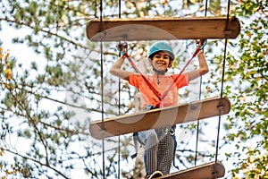 Beautiful little girl having fun in adventure Park, Montenegro