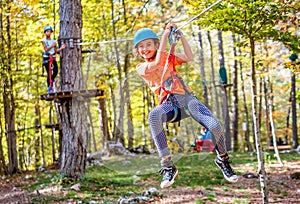 Beautiful little girl having fun in adventure Park, Montenegro