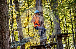 Beautiful little girl having fun in adventure Park, Montenegro