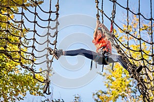 Beautiful little girl having fun in adventure Park, Montenegro