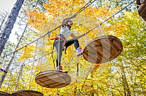 Beautiful little girl having fun in adventure Park, Montenegro