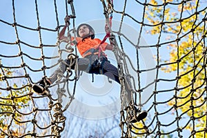 Beautiful little girl having fun in adventure Park, Montenegro