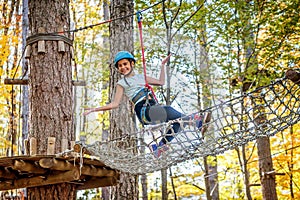 Beautiful little girl having fun in adventure Park, Montenegro