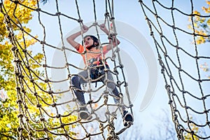 Beautiful little girl having fun in adventure Park, Montenegro