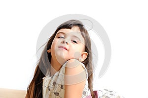 Beautiful little girl isolated on a white background.