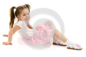 Beautiful little girl laughing.Isolated on white background.