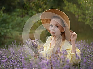 Beautiful little girl on lavender field