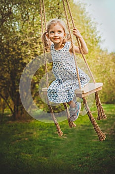 Beautiful little girl playing outdoor