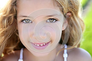 Beautiful little girl portrait smiling closeup face