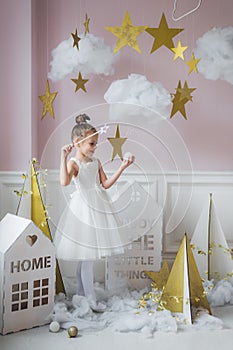 Beautiful little girl in princess dress with long hair