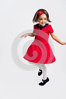 Beautiful little Girl smiling in red dress