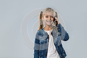 Beautiful Little Girl Speak Cell Smart Phone Call Happy Smiling Wear Jeans Coat Isolated