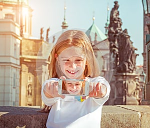 Beautiful little girl taken pictures of her self