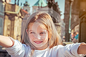 Beautiful little girl taken pictures of her self