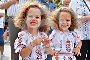 Beautiful little girls at `Ziua Iei ` - International Day of the Romanian Blouse