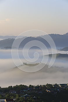 Beautiful little houses on the plateau with dense fog and magic light at dawn part 21
