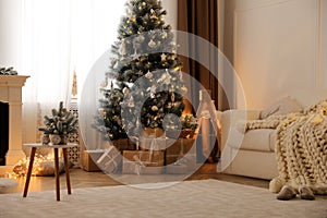 Beautiful living room interior with decorated Christmas tree and gifts