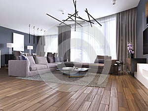 Beautiful living room interior with hardwood floors and large corner sofa violet color in new luxury home. Contemporary style