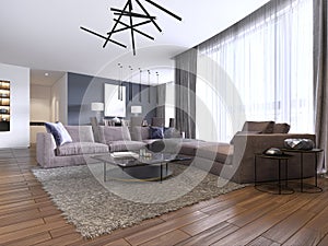 Beautiful living room interior with hardwood floors and large corner sofa violet color in new luxury home. Contemporary style