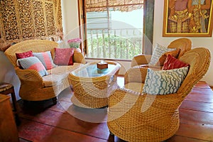 Beautiful living room. Sofa made of rattan. Thai style living room.