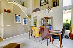 Beautiful living room with white carpet and colorful decor.