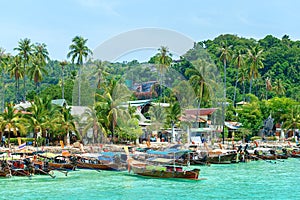 Beautiful Long beach with long tail boat, Phi Phi island, Thailand. Travel  Asia concept.