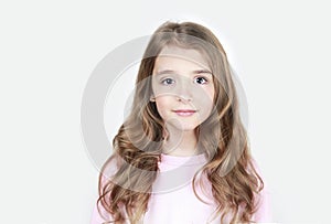 Beautiful long hair smiling face caucasian child girl teen age closeup portrait