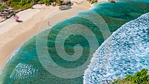 Beautiful Long White Waves and Crystal Clear Water on Atuh beach, Nusa Penida, Bali, Indonesia