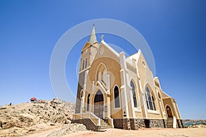 Beautiful low angle view of the protestant german colonial church Felsenkirche in LÃ¼deritz / Luderitz in Namibia,
