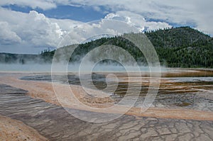 Beautiful low eye level view of Grand Prismatic Spring inside of Yellowstone National Park