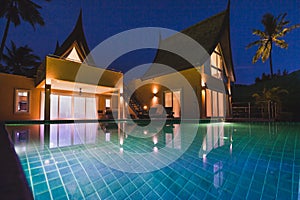 Beautiful luxurious villa at twilight, luxury private expensive house with swimming pool
