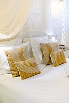 Beautiful luxury pillow on decoration in bedroom interior Light brown and beige colors