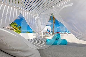 Beautiful luxury vip canopy umbrella and chair around beach sea ocean with blue sky for resort travel vacation