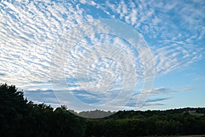 Beautiful mackerel sky cirrocumulus altocumulus cloud formations photo