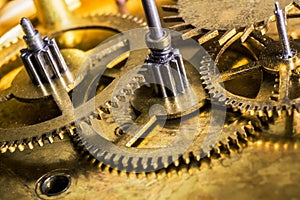 Beautiful macro close-up on clockwork mechanism with gears.