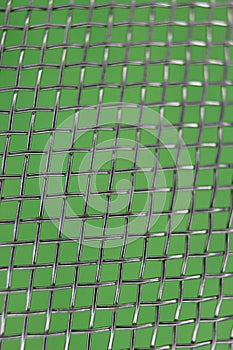 beautiful macro photo of an abstract metal kitchen strainer background photo