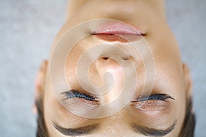 Beautiful macro shot of female eye with extreme long eyelashes a