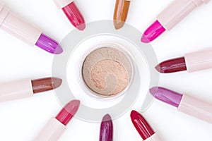 Beautiful makeup loose powder and various colors of lipsticks