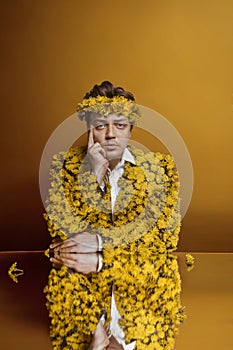 Beautiful man with dandelion coat portrait background beauty portrait photoshoot