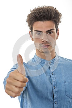 Beautiful man showing thumbs up for ok