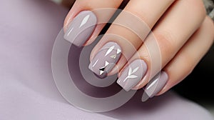 Beautiful manicure. Long almond shaped nails. Nail design. Manicure with gel polish. Close-up of the hand of a young